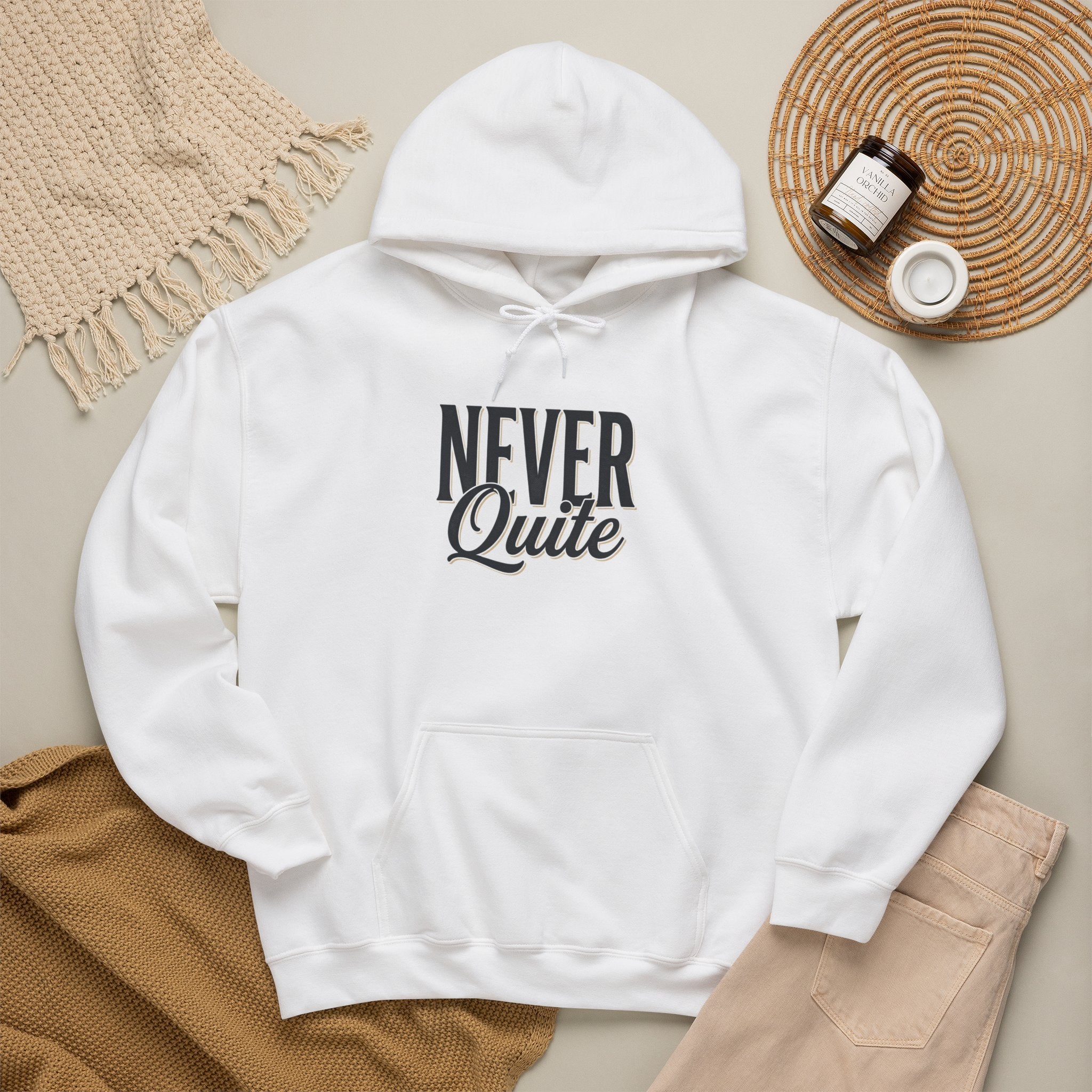 Never Quite Done hoodie script print close-up