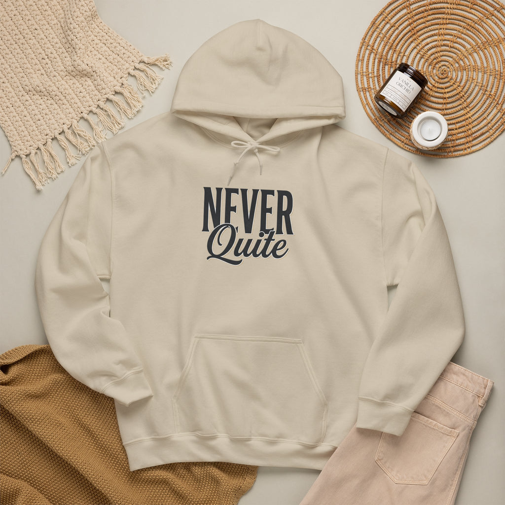 Never Quite Done hoodie script print close-up